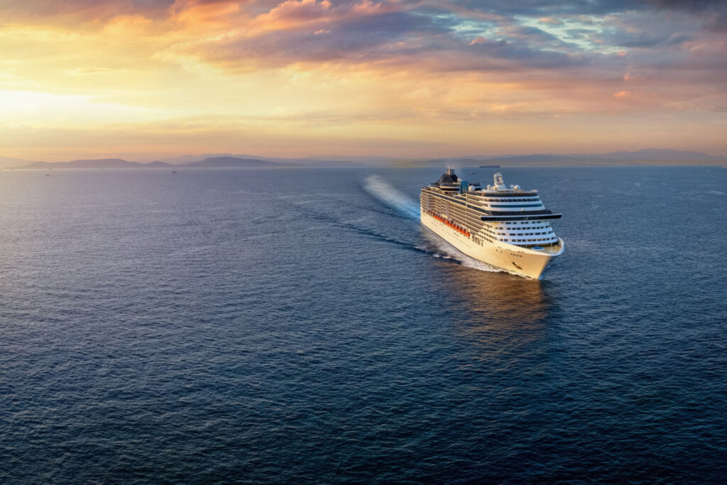 Panoramic,Aerial,View,Of,A,Cruise,Ship,Traveling,Over,The