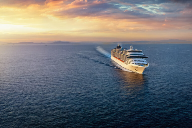 Panoramic,Aerial,View,Of,A,Cruise,Ship,Traveling,Over,The